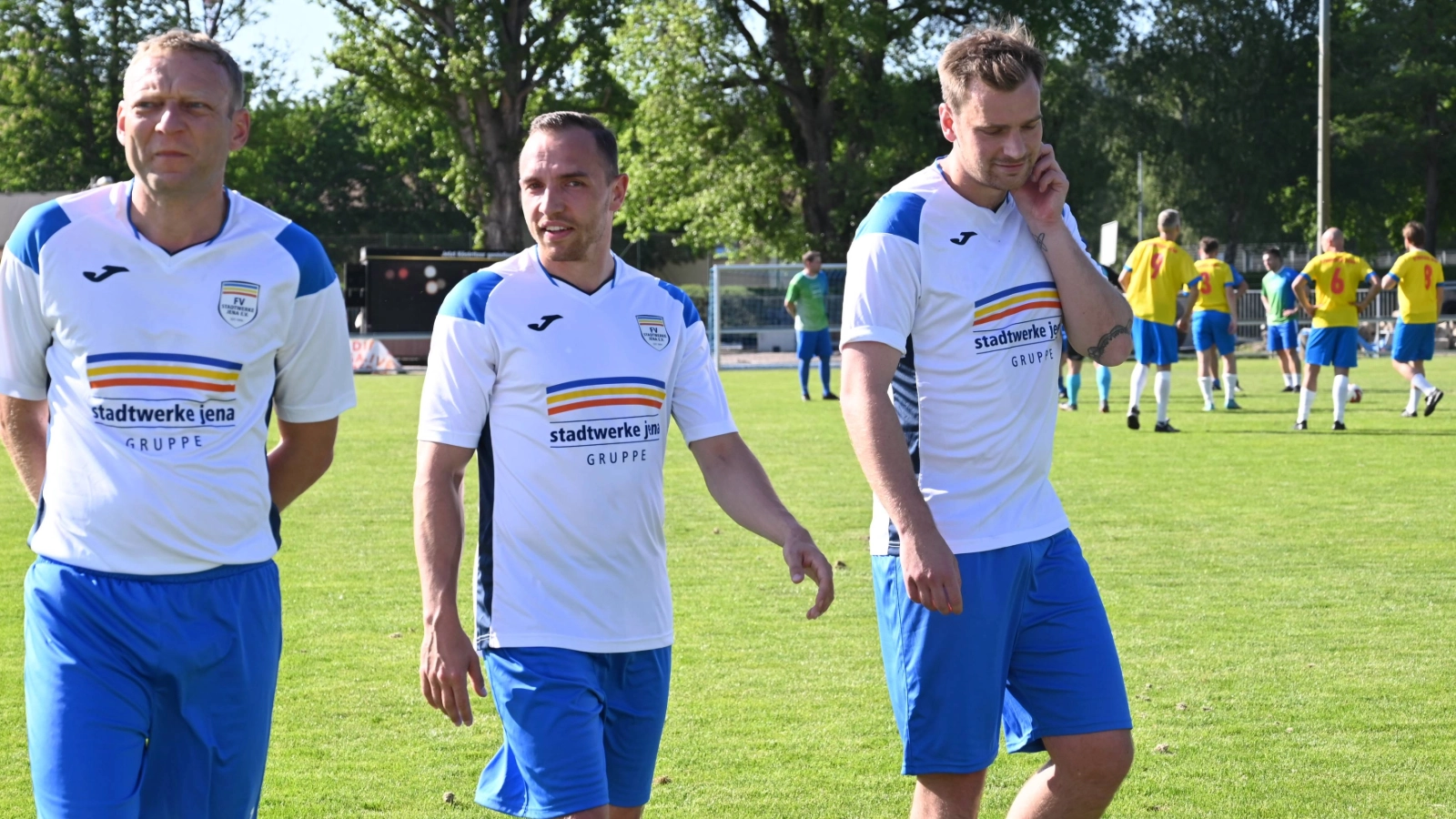 Drei Spieler der Stadtwerke Jena-Mannschaft. 